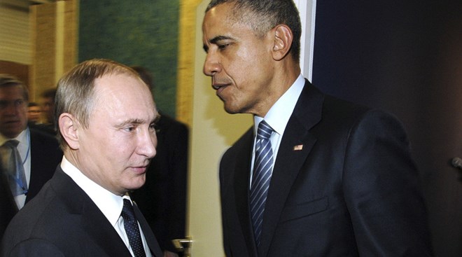 Tổng thống Nga Vladimir Putin (trái) và người đồng cấp Mỹ Barack Obama trong một cuộc gặp. (Nguồn: RT)