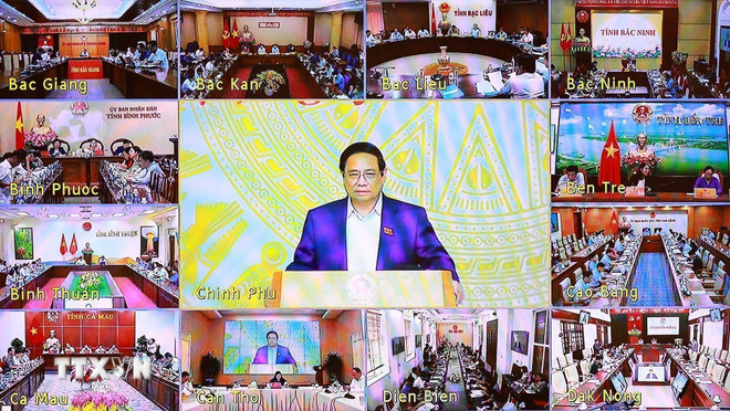 Thủ tướng Phạm Minh Chính chủ trì Phiên họp lần thứ tư của Ban Chỉ đạo xóa nhà tạm, nhà dột nát trực tuyến đến các địa phương. Ảnh: TTXVN