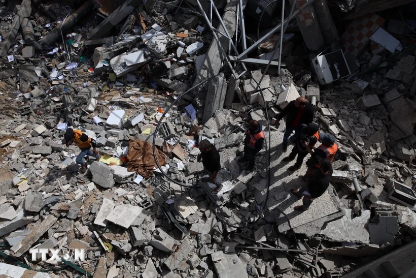Cảnh đổ nát sau các cuộc không kích của Israel xuống Dải Gaza ngày 27/3. (Ảnh: THX/TTXVN