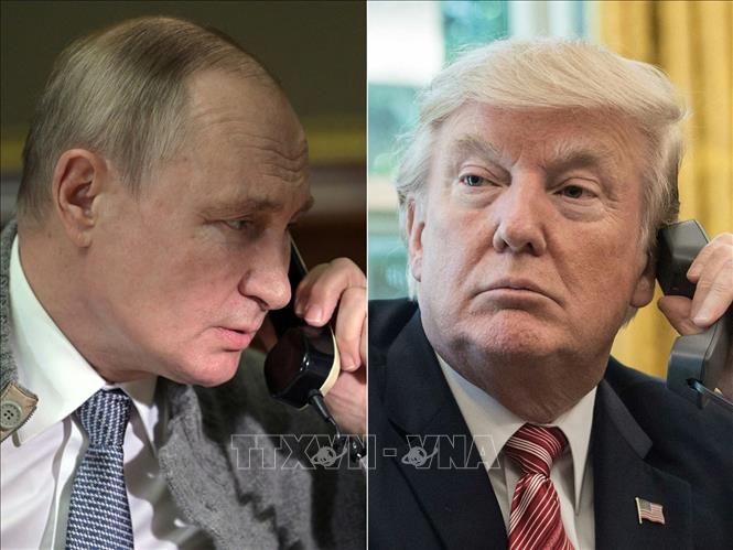 Tổng thống Mỹ Donald Trump (trái) và Tổng thống Nga Vladimir Putin. Ảnh tư liệu: Getty Images/TTXVN