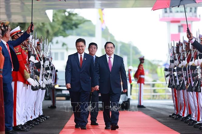 Lễ đón Thủ tướng Phạm Minh Chính tại Labuan Bajo, Indonesia. Ảnh: TTXVN