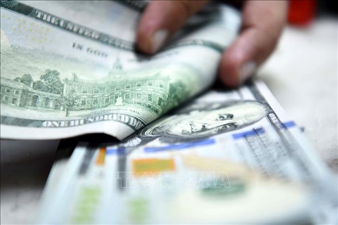 Đồng USD Mỹ. Ảnh: THX/TTXVN