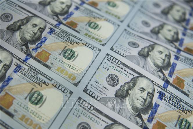 Đồng USD. Ảnh: AFP/TTXVN