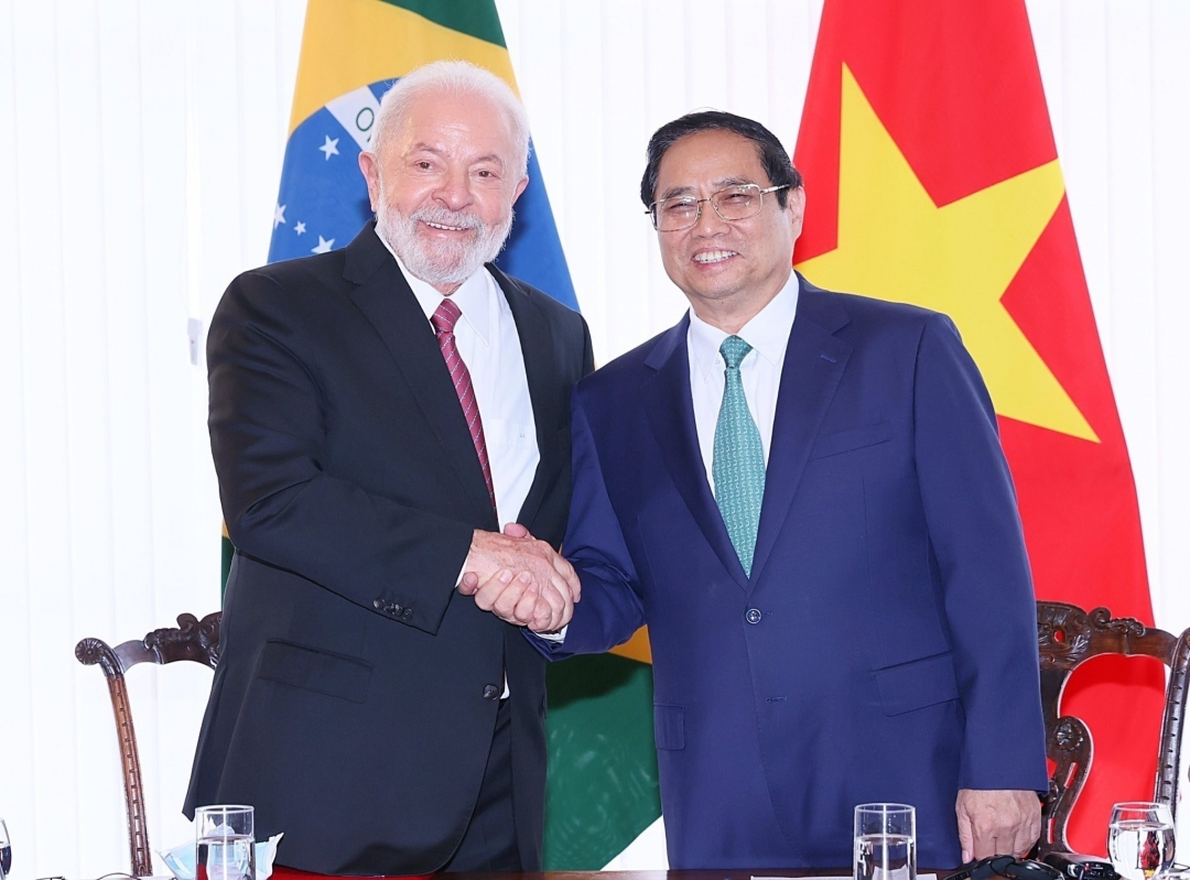 Thủ tướng Phạm Minh Chính với Tổng thống Brazil Lula da Silva. (Ảnh: Dương Giang/TTXVN