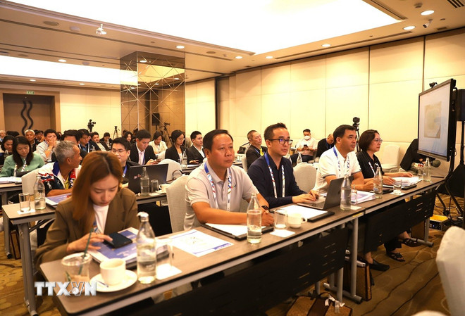 Nhà báo, phóng viên thể thao từ Việt Nam sang tham dự hội nghị. Ảnh: TTXVN