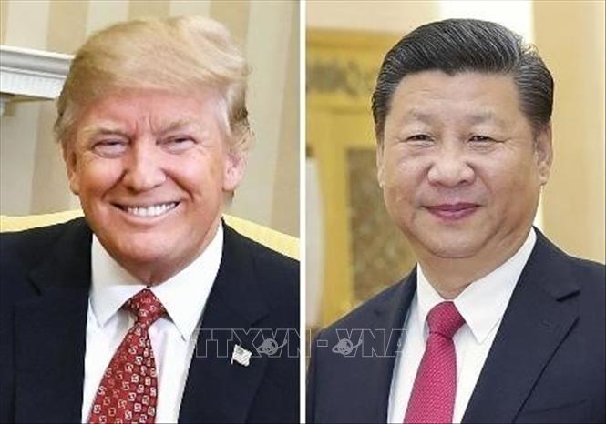 Chủ tịch Trung Quốc Tập Cận Bình và Tổng thống Mỹ Donald Trump. Ảnh tư liệu: Kyodo/TTXVN