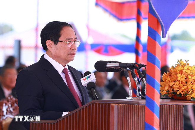 Thủ tướng Phạm Minh Chính phát biểu tại Lễ khai trương Cặp cửa khẩu quốc tế Tân Nam- Meun Chey. Ảnh: TTXVN