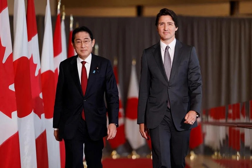 Thủ tướng Canada Justin Trudeau và Thủ tướng Nhật Bản Kishida Fumio. Ảnh: Reuters