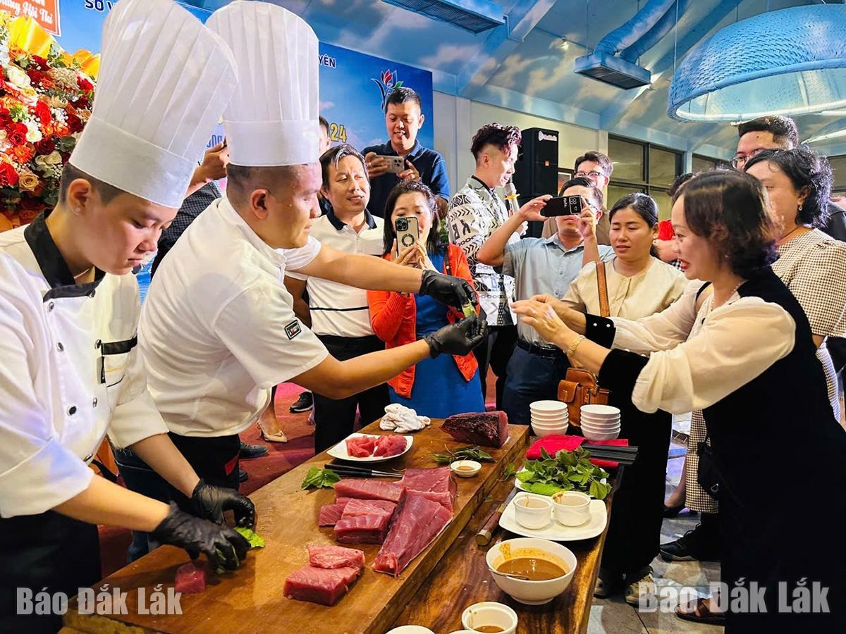 Tourists joyfully tasting tuna sashimi.