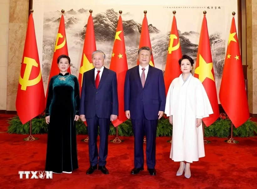 Tổng Bí thư, Chủ tịch nước Tô Lâm và Phu nhân cùng Tổng Bí thư, Chủ tịch nước Trung Quốc Tập Cận Bình và Phu nhân chụp ảnh chung. Ảnh: TTXVN