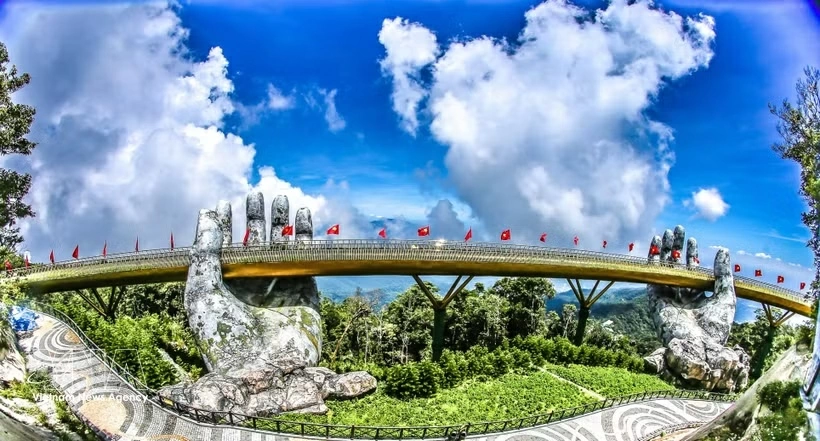 The Golden Bridge at Ba Na Hills, Da Nang, is a popular tourist attraction for both domestic and international visitors. (Photo: VNA)
