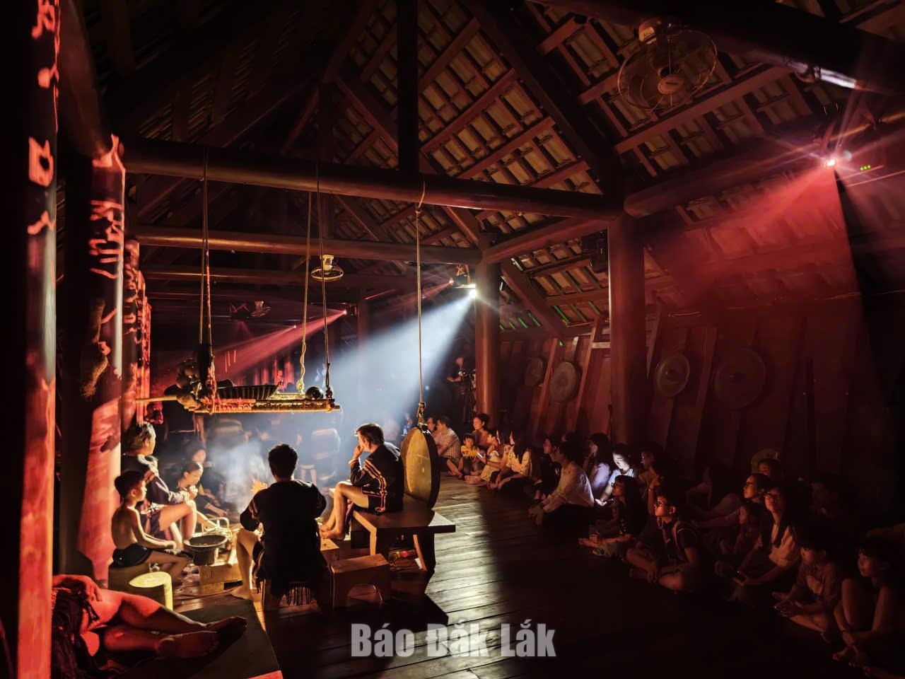 Audiences watching the show “Memories of the Longhouse”.