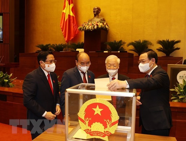 Tổng Bí thư Nguyễn Phú Trọng cùng các lãnh đạo Đảng, Nhà nước bỏ phiếu bầu Thủ tướng Chính phủ nhiệm kỳ 2021-2026. (Ảnh: Trí Dũng/TTXVN)