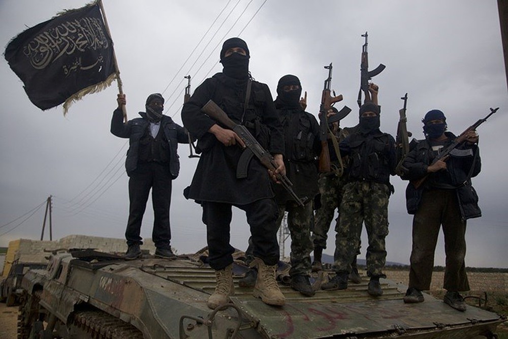 Các tay súng Hayat Tahrir al-Sham (HTS) - một nhánh của Al-Qaeda ở Syria. Ảnh tư liệu: Masdar.