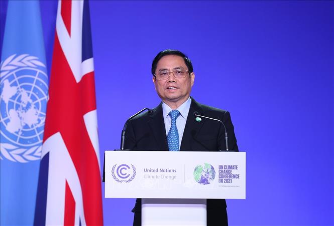 Thủ tướng Phạm Minh Chính phát biểu tại Hội nghị Thượng đỉnh khí hậu trong khuôn khổ Hội nghị lần thứ 26 các Bên tham gia Công ước khung của Liên hợp quốc về Biến đổi khí hậu (COP26). Ảnh: Dương Giang/TTXVN