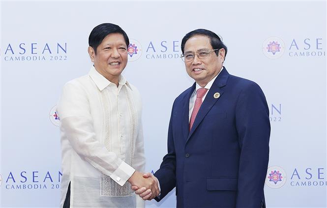Thủ tướng Phạm Minh Chính gặp Tổng thống Philipines Ferdinand Marcos. Ảnh: TTXVN