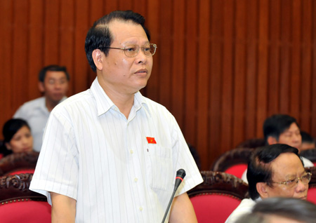 Bộ trưởng Bộ tài chính Vũ Văn Ninh phát biểu sáng nay. Ảnh: Minh Điền