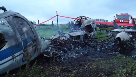 Hiện trường vụ tai nạn máy bay tại Siberia. Nguồn: Ria Novosti.