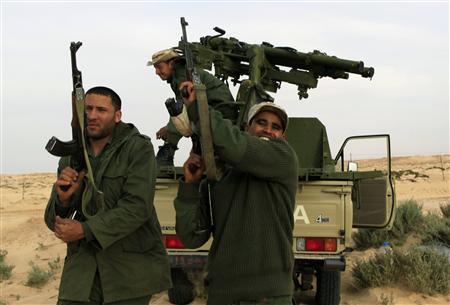 Quân nổi dậy vui mừng trước thông tin Liên hiệp quốc cho phép thiết lập vùng cấm bay tại Libya. Ảnh: Reuters