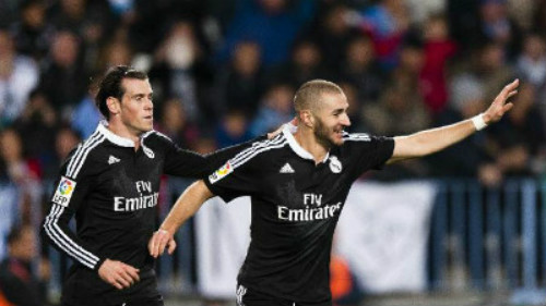 Real có được chiến thắng nhờ bàn thắng của Benzema (phải)