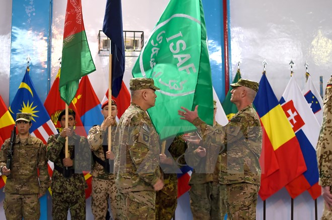 Buổi lễ NATO chính thức kết thúc sứ mệnh chiến đấu tại Afghanistan. (Nguồn: AFP/TTXVN)