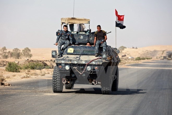 Binh sĩ Iraq trong chiến dịch truy quét IS tại Mosul ngày 31-10. (Nguồn: EPA/TTXVN)