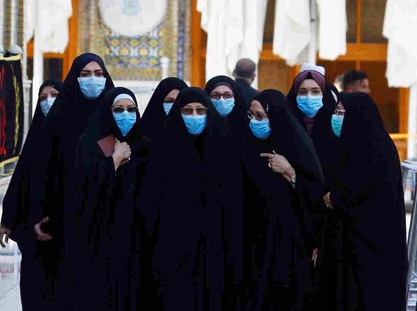 Phụ nữ Iran đeo khẩu trang chống Covid-19. (Nguồn: Reuters)
